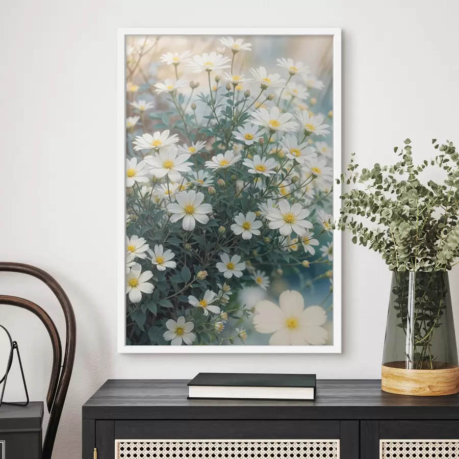 Papier peint Un champ de fleurs de marguerites blanches avec un feuillage vert, sur un fond flou f40413