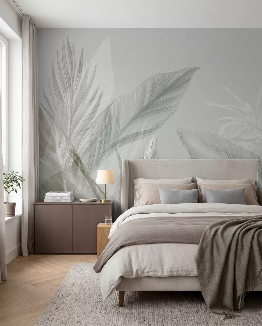 Papier peint Des plumes blanches, vertes et grises douces et des feuilles tropicales flottant sur un fond clair w08241