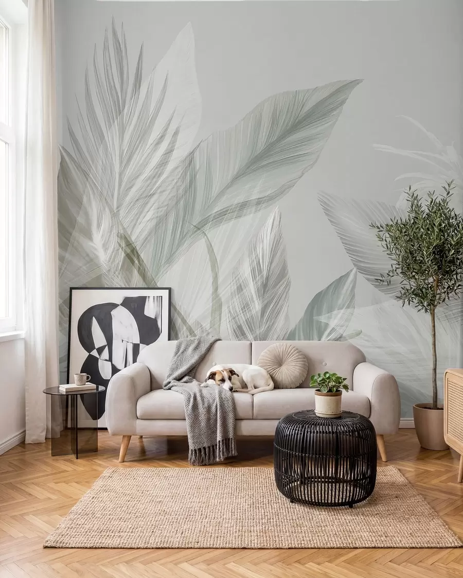 Papier peint Des plumes blanches, vertes et grises douces et des feuilles tropicales flottant sur un fond clair w08241