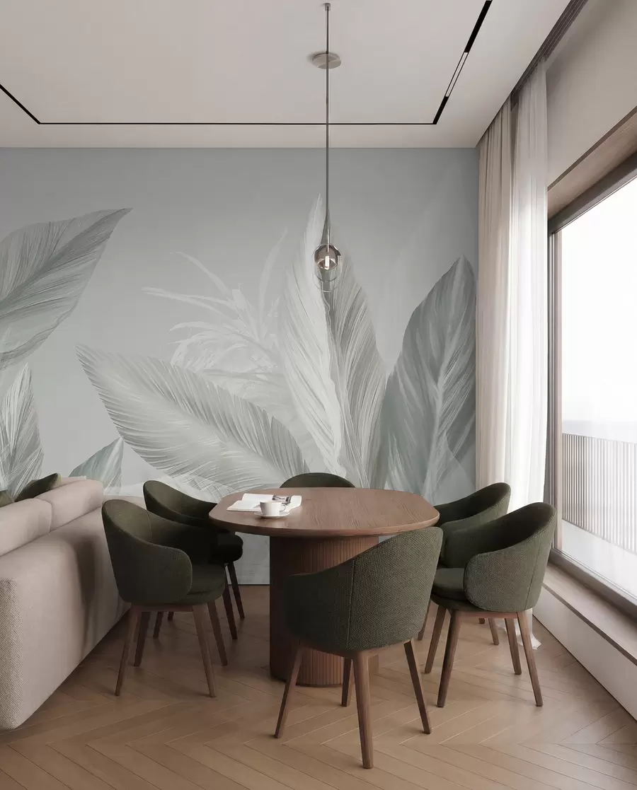 Papier peint Des plumes blanches, vertes et grises douces et des feuilles tropicales flottant sur un fond clair w08241