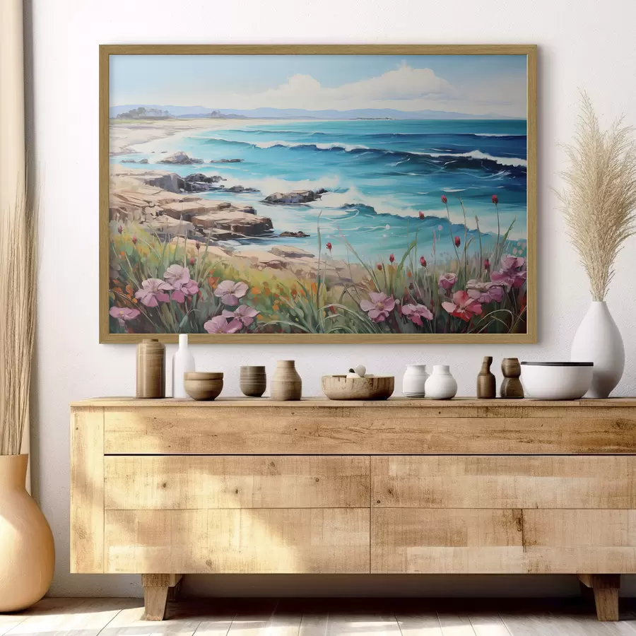 Papier peint Un paysage marin avec des vagues turquoise, un rivage rocailleux et des fleurs lumineuses au premier plan sous un ciel bleu clair f42568