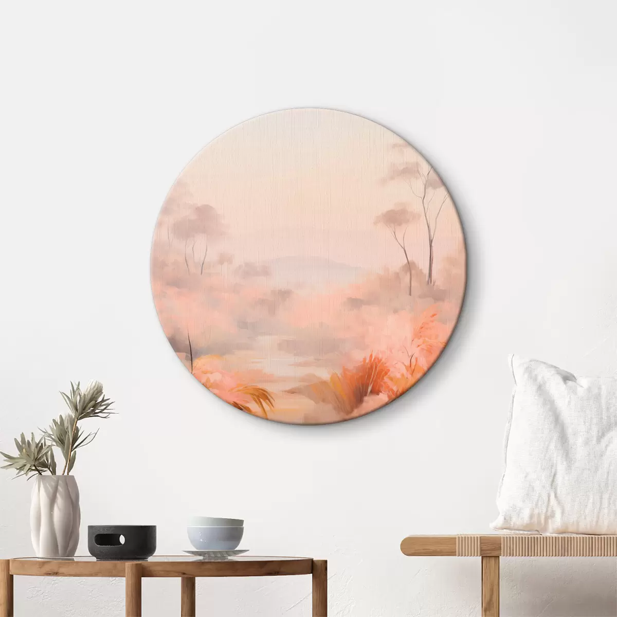 Tableaux rondes Un paysage avec des buissons et des arbres dans les tons rose, orange et marron, avec des montagnes en arrière-plan r45553