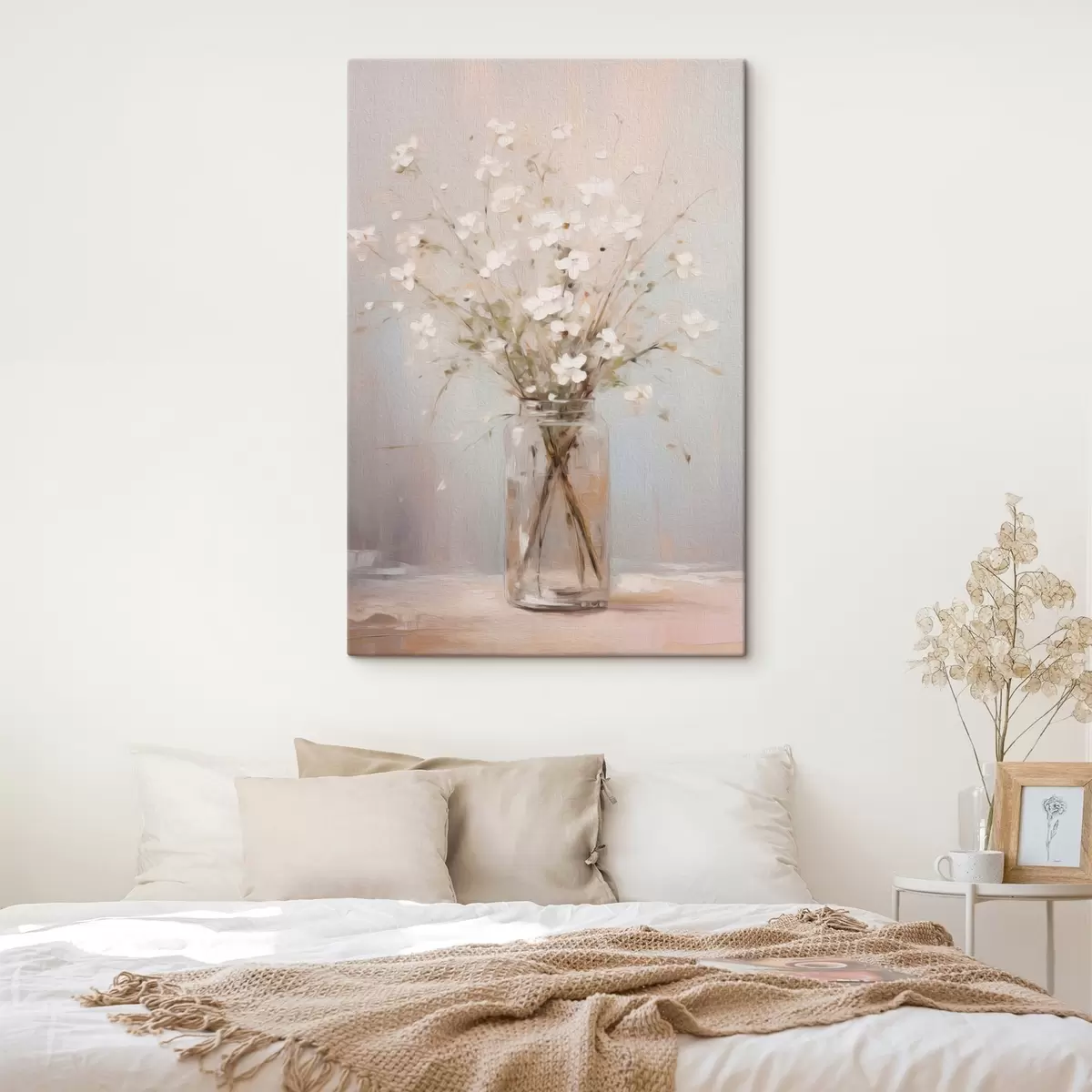 Tableau Un bouquet de fleurs blanches dans un vase en verre transparent s45814
