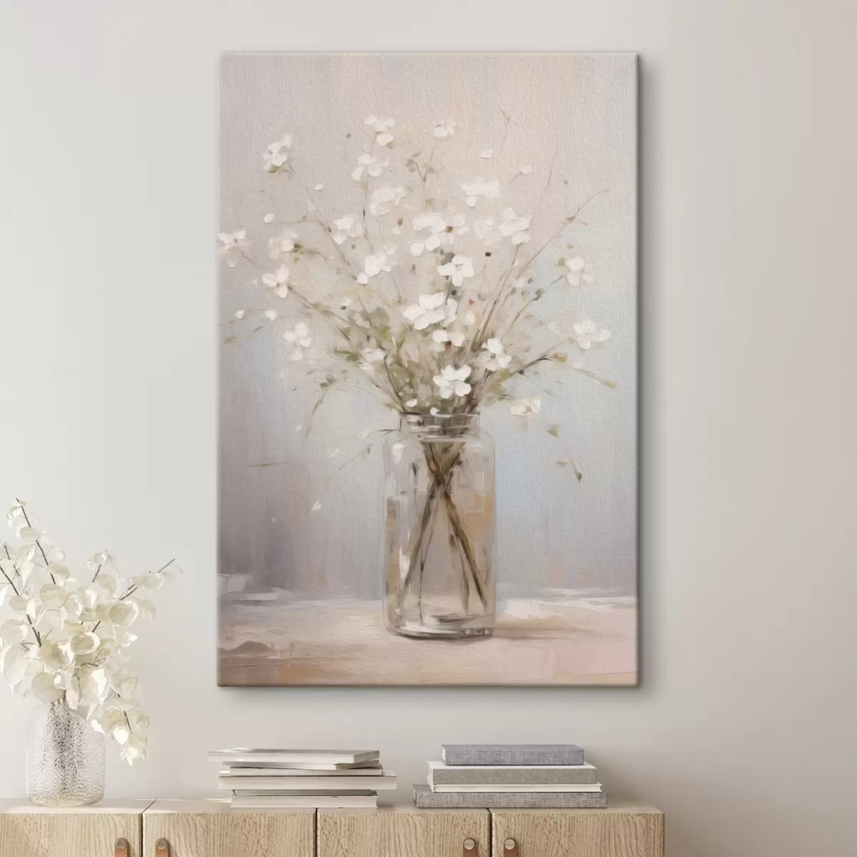 Tableau Un bouquet de fleurs blanches dans un vase en verre transparent s45814