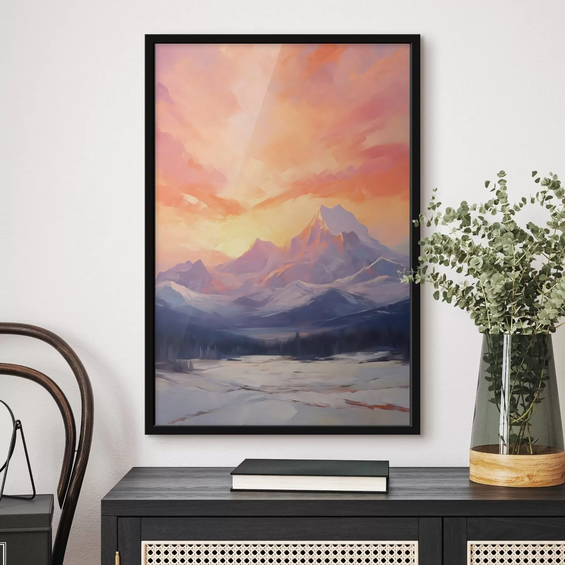 Papier peint Des montagnes aux sommets enneigés sous un ciel aux teintes vives d'orange et de rose, parsemé de nuages f48741
