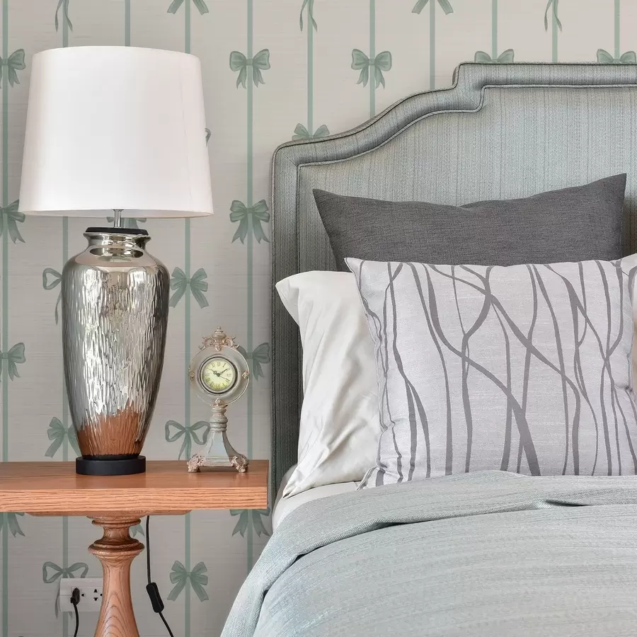 Papier peint Des nœuds verts avec des rubans sur fond beige a01074v1