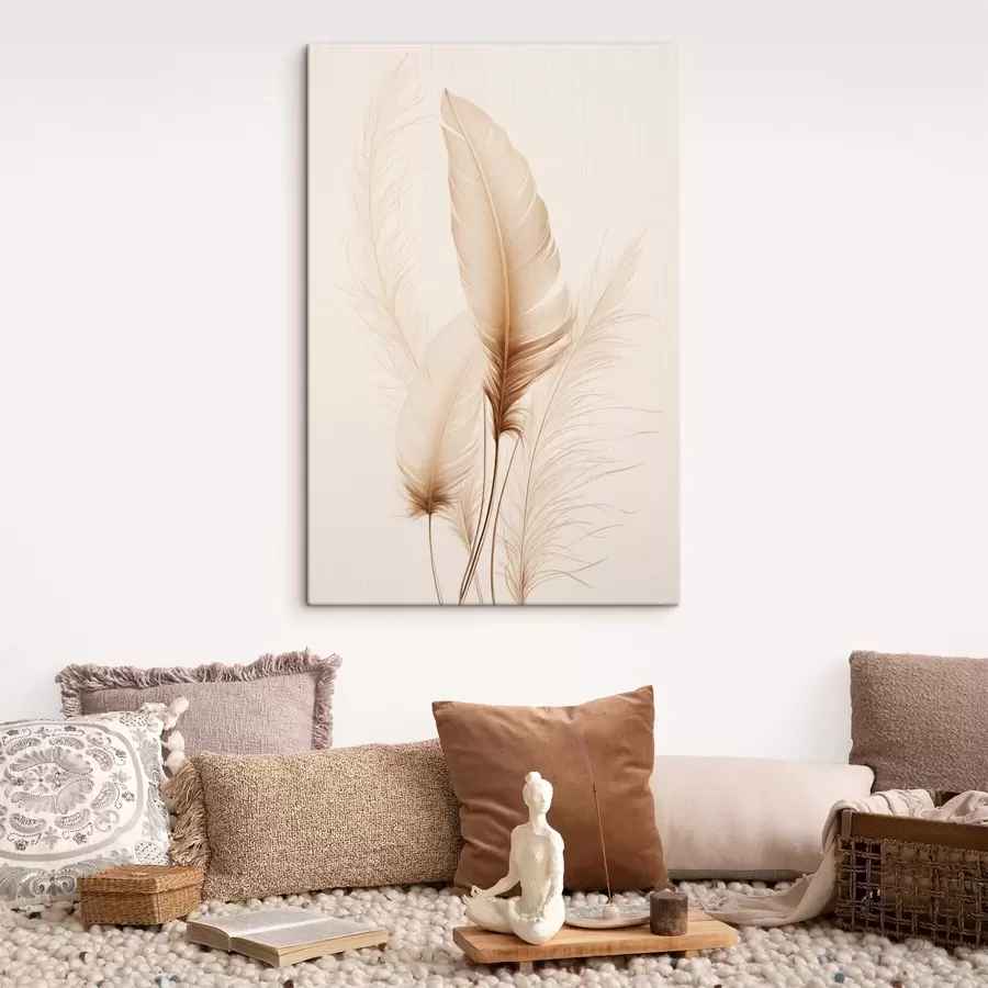 Tableau Des plumes brun clair et quelques brins d'herbe séchée sur un fond clair s49158