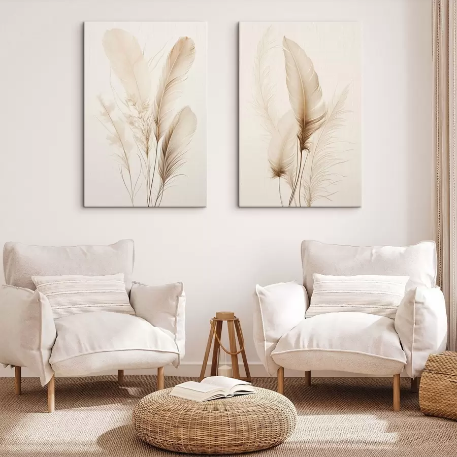Tableau Des plumes brun clair et quelques brins d'herbe séchée sur un fond clair m30475