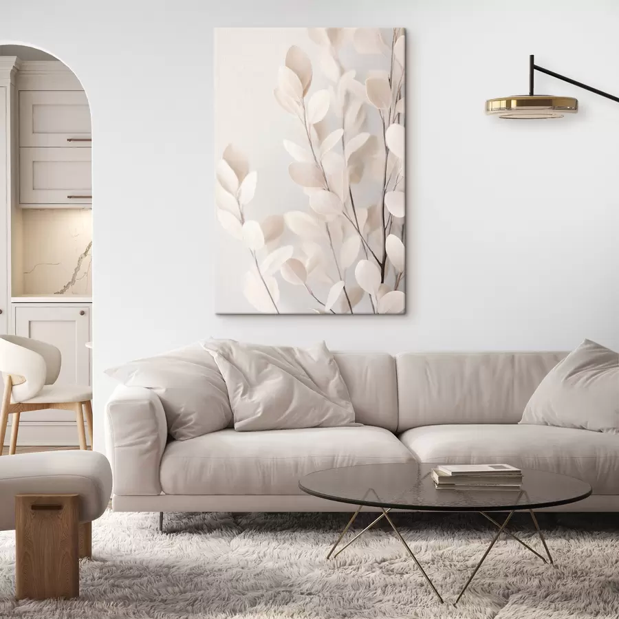 Tableau Des feuilles d'eucalyptus beige pâle sur un fond clair et texturé s49794