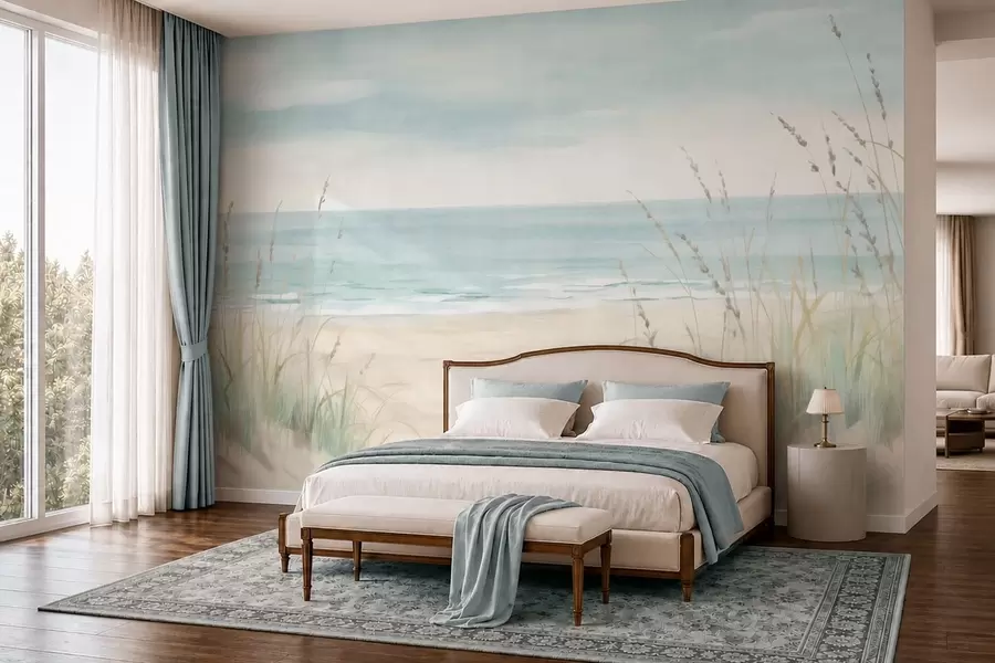 Papier peint Du sable parsemé de coquillages, une plage au relief doux et des herbes aux teintes pastel délicates w05821
