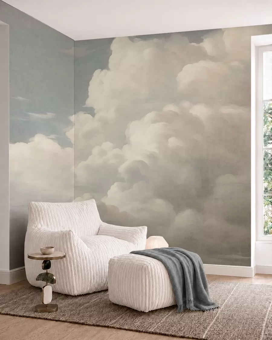 Papier peint Une brume nacrée, parsemée de nuages doux et crémeux qui dérivent dans un ciel serein w05855