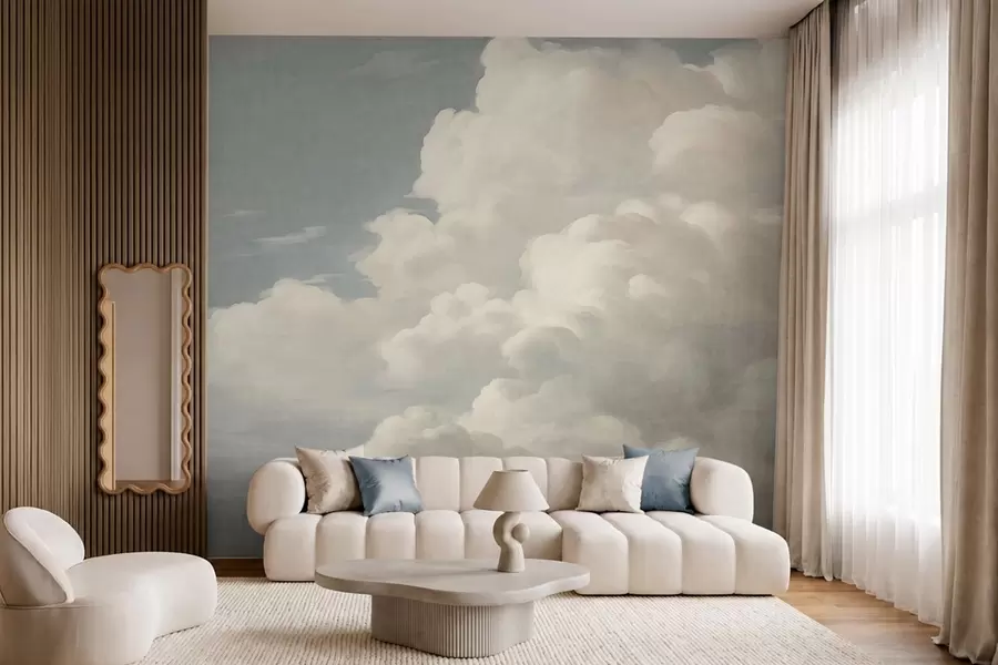 Papier peint Une brume nacrée, parsemée de nuages doux et crémeux qui dérivent dans un ciel serein w05855