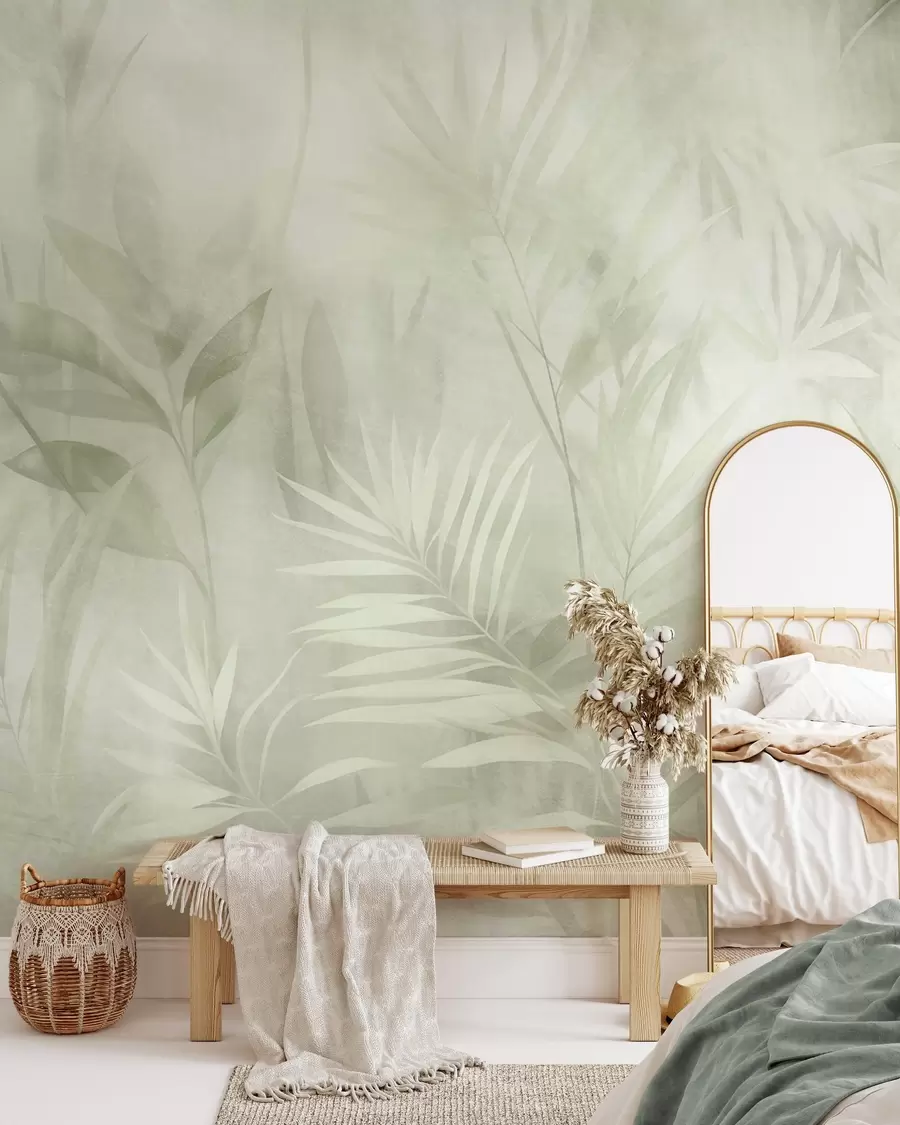 Papier peint Des feuilles de palmier aux nuances de vert discrètes, sur un fond doux, dans une jungle tropicale w10023v1