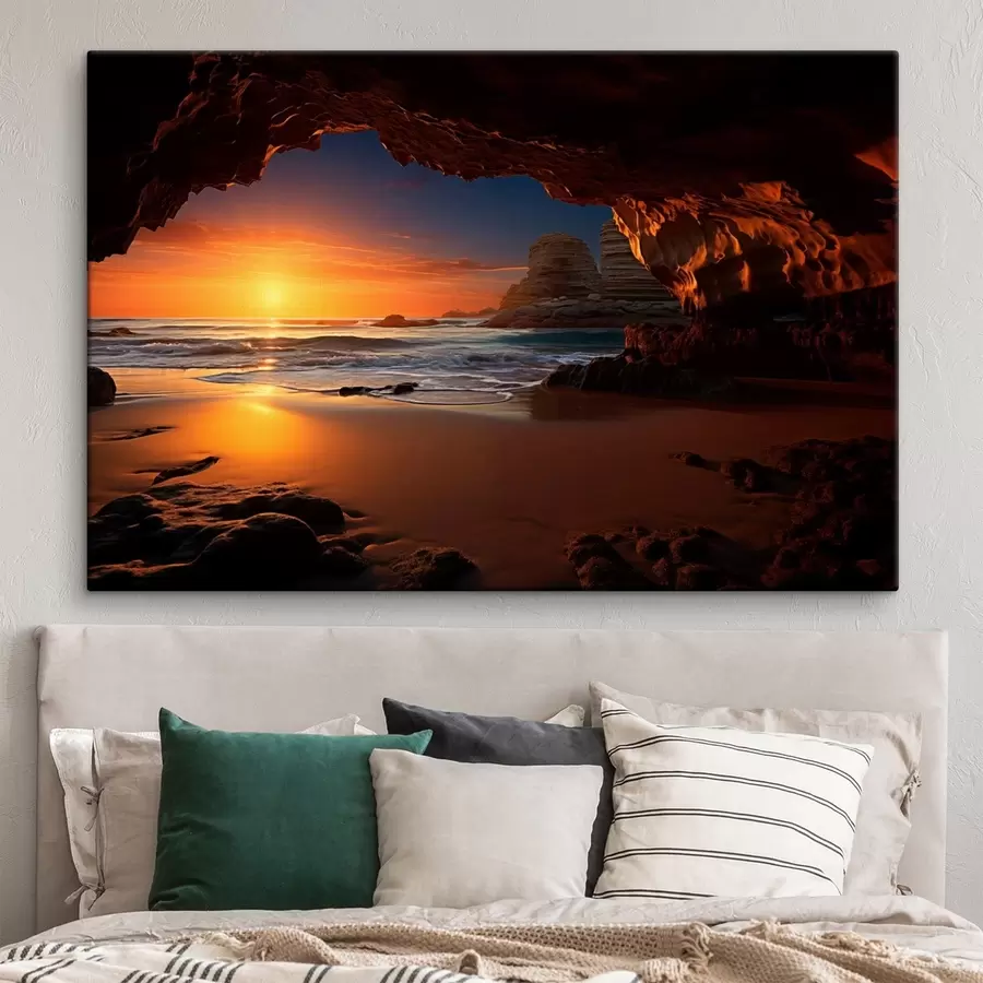 Tableau Coucher de soleil en bord de mer, encadré par une grotte rocheuse s50594