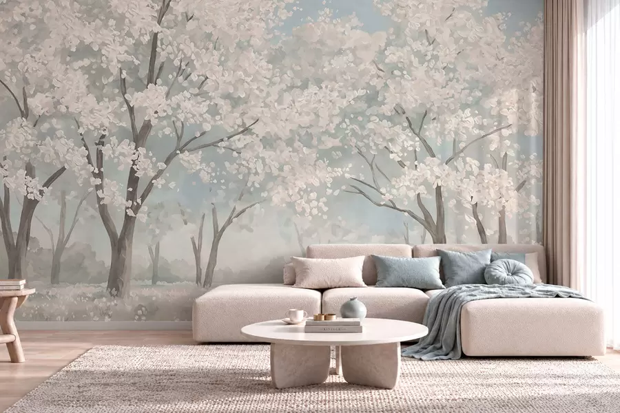 Papier peint Des arbres en fleurs aux teintes pâles dans une prairie aux tons pastel w05897